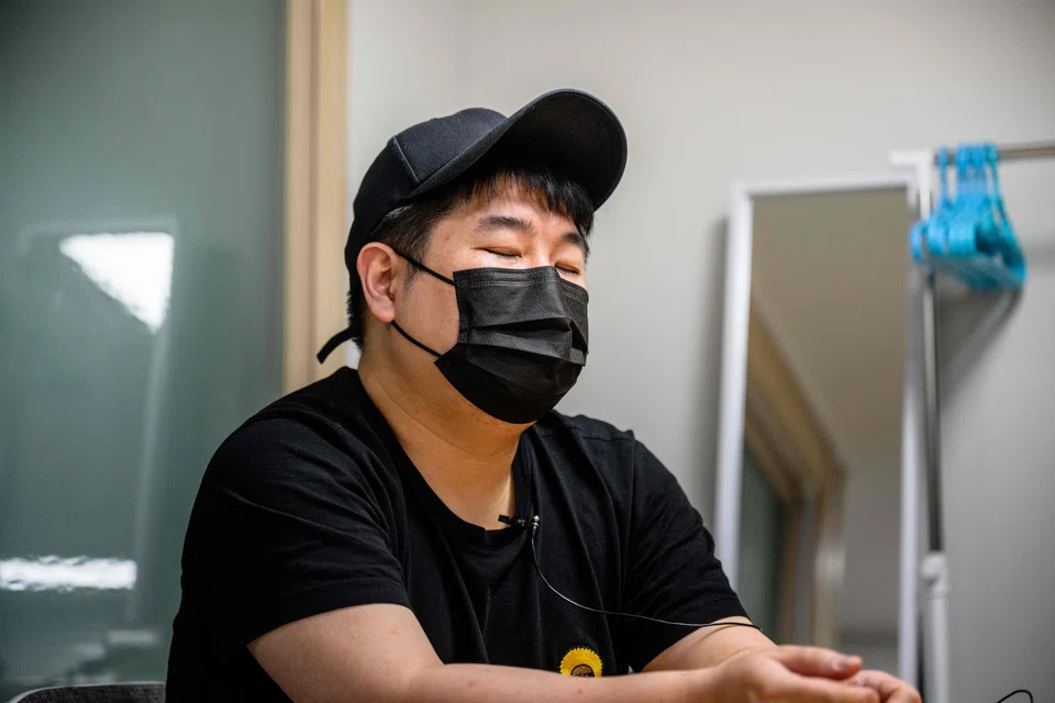 Park Hyeon Su, a "jeonse" real estate scam victim, reacts during an interview with AFP at his flat in Seoul, South Korea.