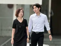 Ng Chiew Yen (left) and Keith Tan Kai Wen arriving at the State Courts on Sept 20, 2024.