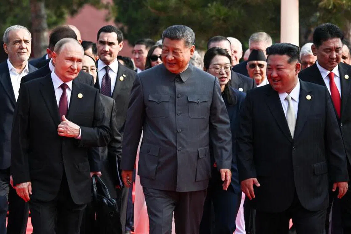 From left: Russia's President Vladimir Putin walking with China's President Xi Jinping and North Korea's leader Kim Jong Un before a military parade marking the 80th anniversary of victory over Japan and the end of World War II, in Tiananmen Square, Beijing, on Sep 3. 