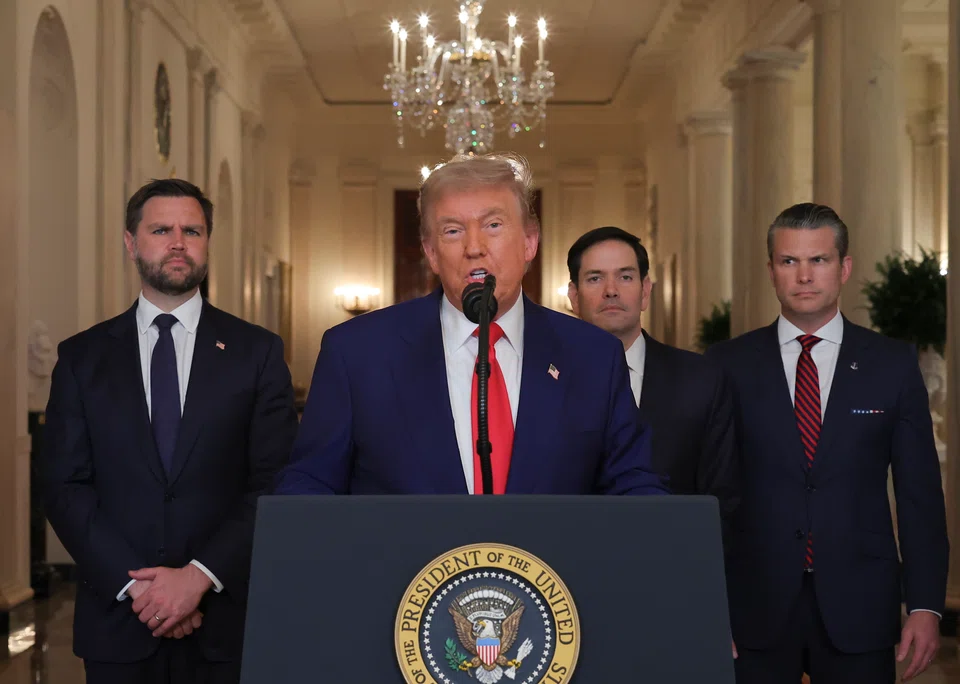 US President Donald Trump with US Secretary of Defense Pete Hegseth (extreme right), US Vice-President JD Vance (extreme left) and US Secretary of State Marco Rubio (second from right) as he delivers an address to the nation at the White House following US strikes on Iran's nuclear facilities. 