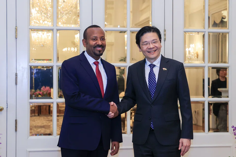 Ethiopian Prime Minister Abiy Ahmed Ali (left) met Singapore Prime Minister Lawrence Wong at the Istana when he made his first official visit to the city-state in June 2024.