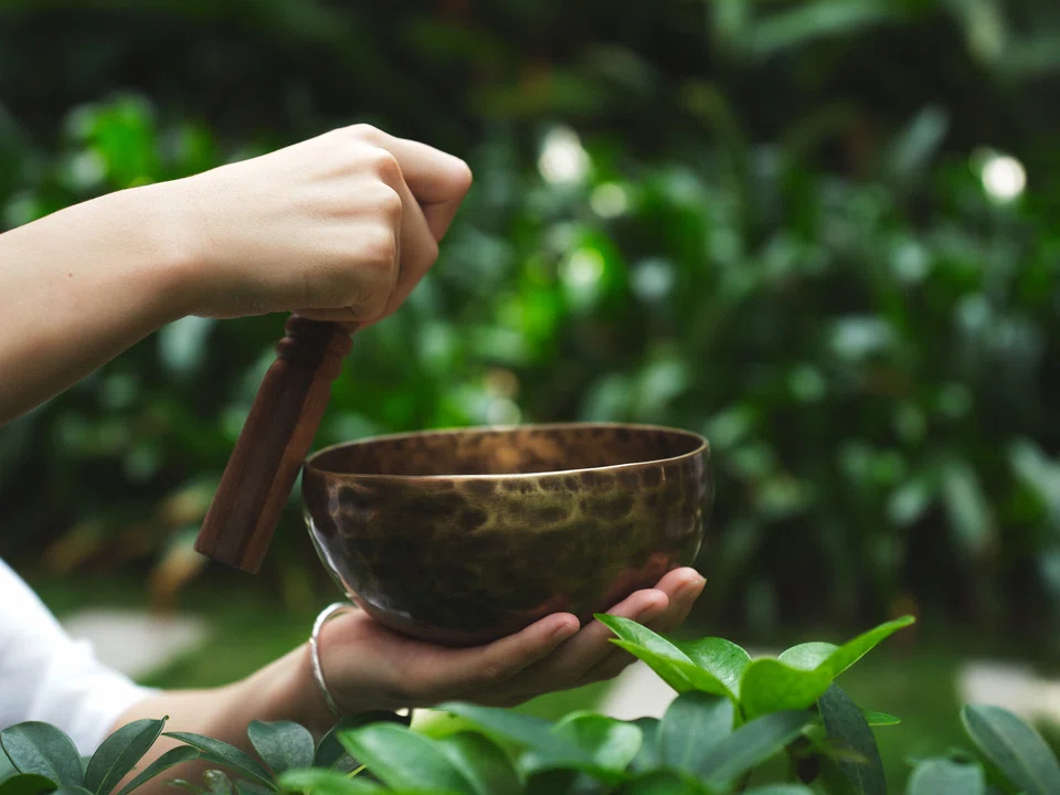 Bronze singing bowls are a common tool in sound healing.