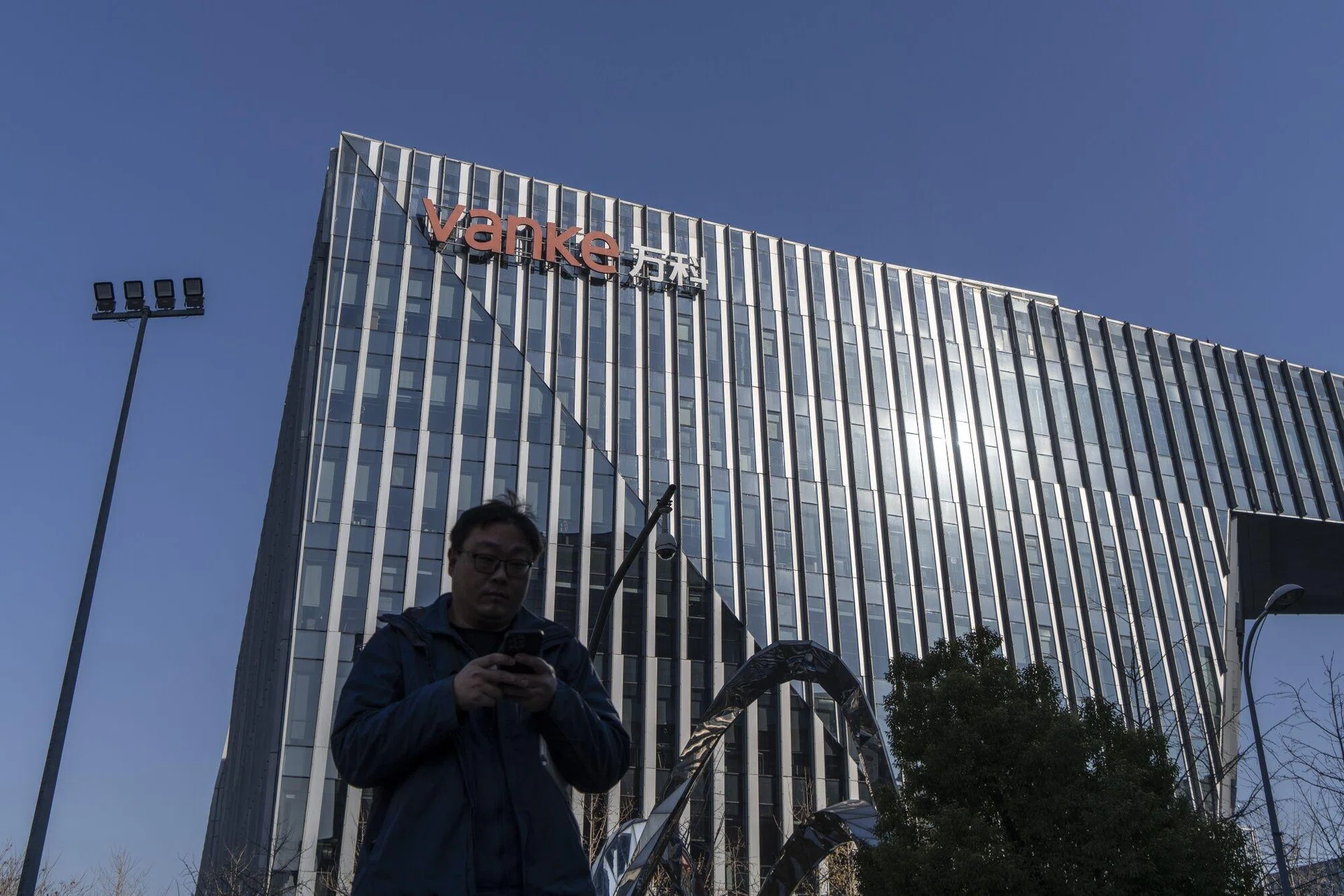 China property woes deepen as Vanke seeks bond payment delay