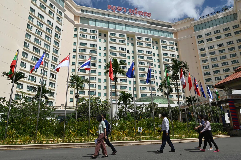 People walk in front of the Sokha hotel during the 55th ASEAN Foreign Ministers’ Meeting in Cambodia in August. As a whole, Asean has remained an attractive investment destination despite the decline in foreign direct investment during the pandemic. 