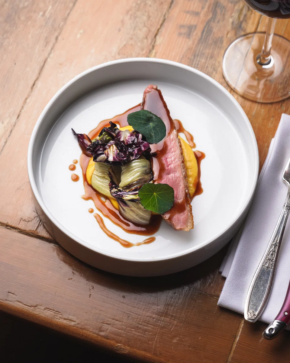 Burdock’s dry aged duck with squash and radicchio.