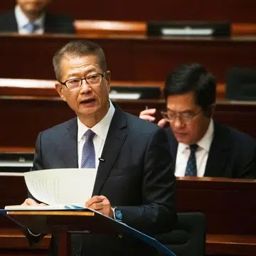 Hong Kong Financial Secretary Paul Chan has brought the city out of the red three years earlier than expected.