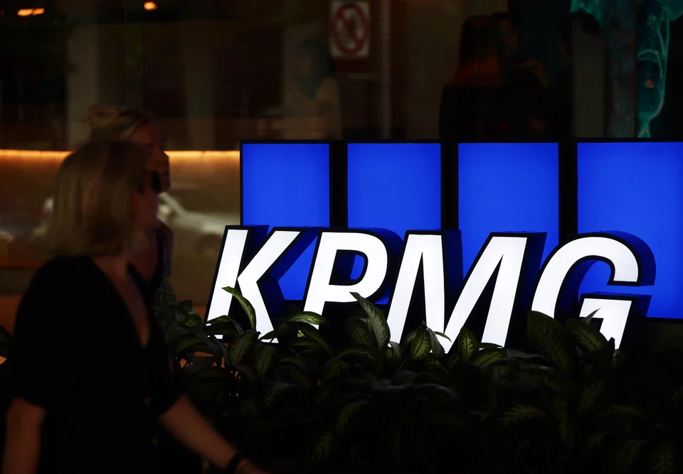 The US accounting watchdog cites widespread improper answer sharing at the KPMG affiliate.