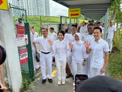 PAP's Grace Fu with the party's Jurong East-Bukit Batok GRC candidates. 