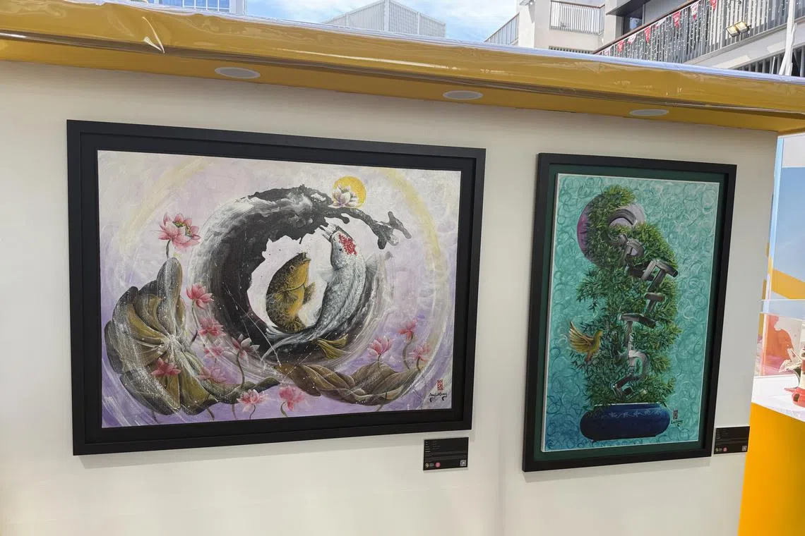 Artworks by Ang Lai Seng, an inmate in Changi Prison, on display at the Yellow Ribbon Community Arts Festival. His works are inspired by religious imagery and Chinese cultural symbols.