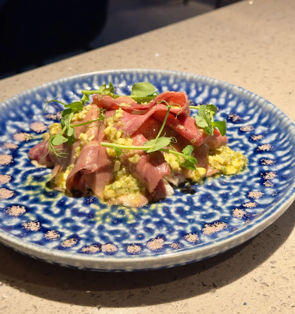 Slow-cooked ox tongue served in sauce gribiche.
