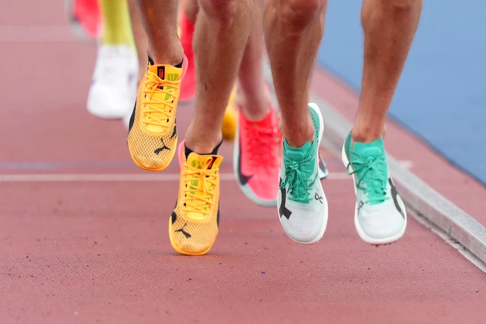 The Puma spikes worn by Sam Atkin (Great Britain), left, and the Adidas spikes worn by George Mills (Great Britain) seen during the 5,000m race at the Grand Slam Track Miami at Ansin Sports Complex, Florida. The planned series will delve into one of the most fascinating fraternal blow-ups in corporate history.