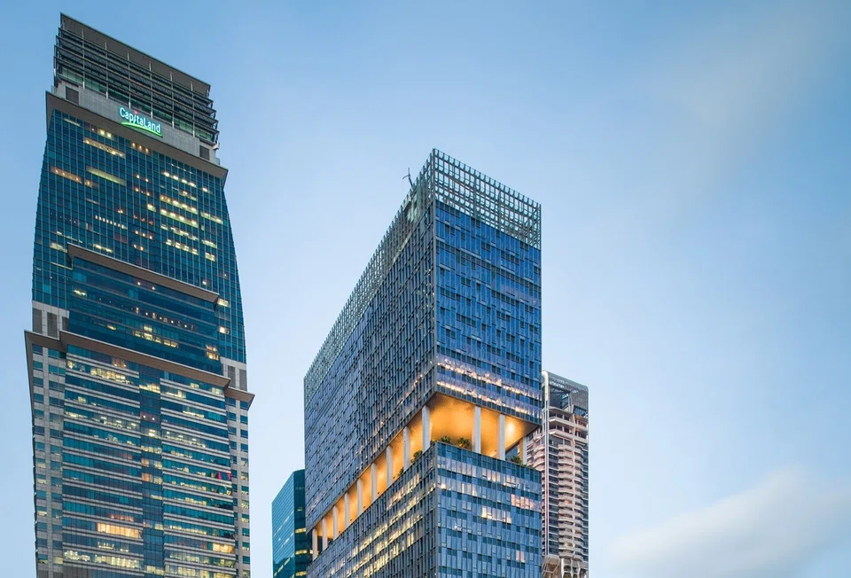 Capital Tower (left) and CapitaSky (right). CapitaLand Investment's revenue for H1 fell 24% to S$1.04 billion from S$1.37 billion.