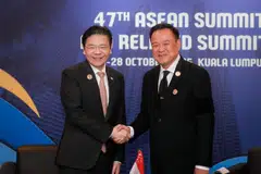 Singapore Prime Minister Lawrence Wong (left) with Thai Prime Minister Anutin Charnvirakul on the sidelines of the 47th Asean Summit in Kuala Lumpur on Oct 27.