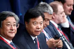File photo of Wang Yilin (second left), former chairman and party secretary of China National Petroleum Corp. Wang illegally accepted high value assets and goods and took advantage of his position to help others seek benefits in project contracting and business operations, according to China state media.