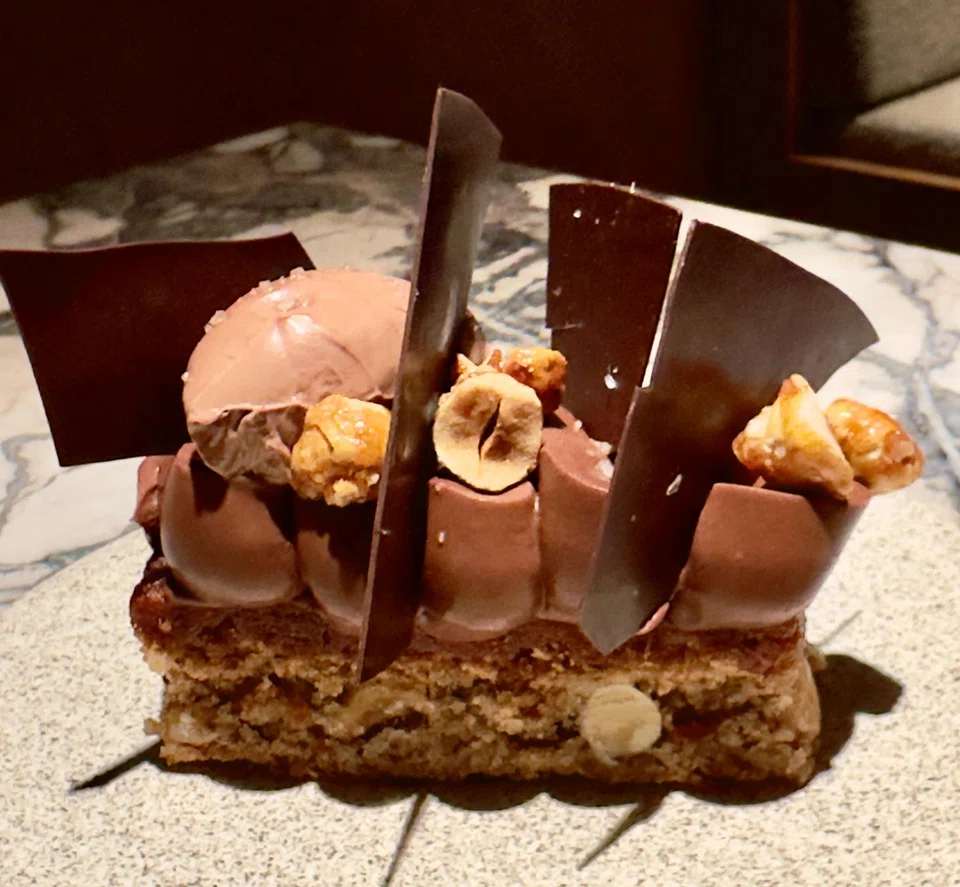 Chocolate, hazelnuts and crunchy feuilletine come together in the dessert called rock 'n' roll.