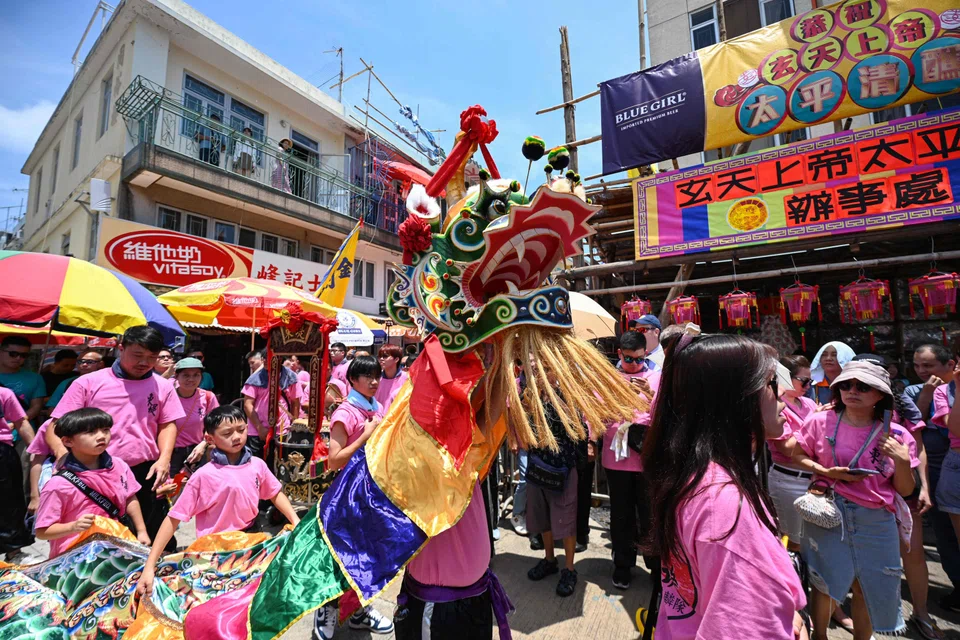 Performers participate in the "Piu Sik" parade on the island of Cheung Chau during its annual Bun festival in Hong Kong on May 15.