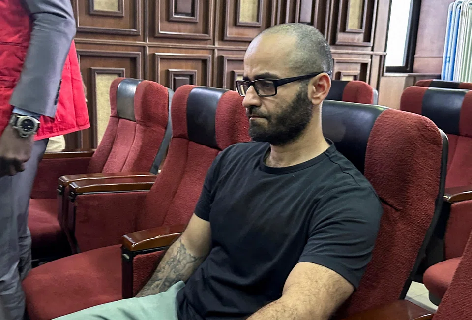Tigran Gambaryan, an executive of Binance, sits as he waits to face prosecution for tax evasion and money laundering at the federal high court in Abuja, Nigeria.