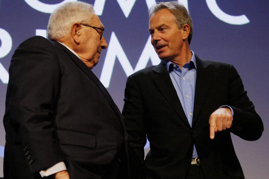 Former US secretary of state Henry Kissinger (left) with former British prime minister Tony Blair in Davos in 2008. Blair is said to share many of Kissinger’s qualities, in addition to traits that make him more suited to the modern age. 
