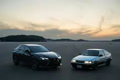 The Lexus RZ (left) electric vehicle with the Toyota AE86 BEV Concept at Toyota's Shimoyama Technical Center.