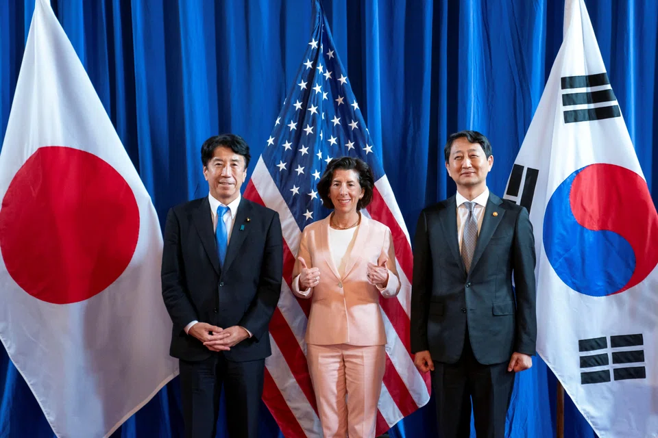 (From left) Japan’s Economy, Trade and Industry Minister Ken Saito, US Commerce Secretary Gina Raimondo and South Korea’s Minister of Trade, Industry and Energy Ahn Duk Geun at the inaugural Trilateral Commerce and Industry Ministerial Meeting at the Commerce Department in Washington, US, June 26, 2024. 