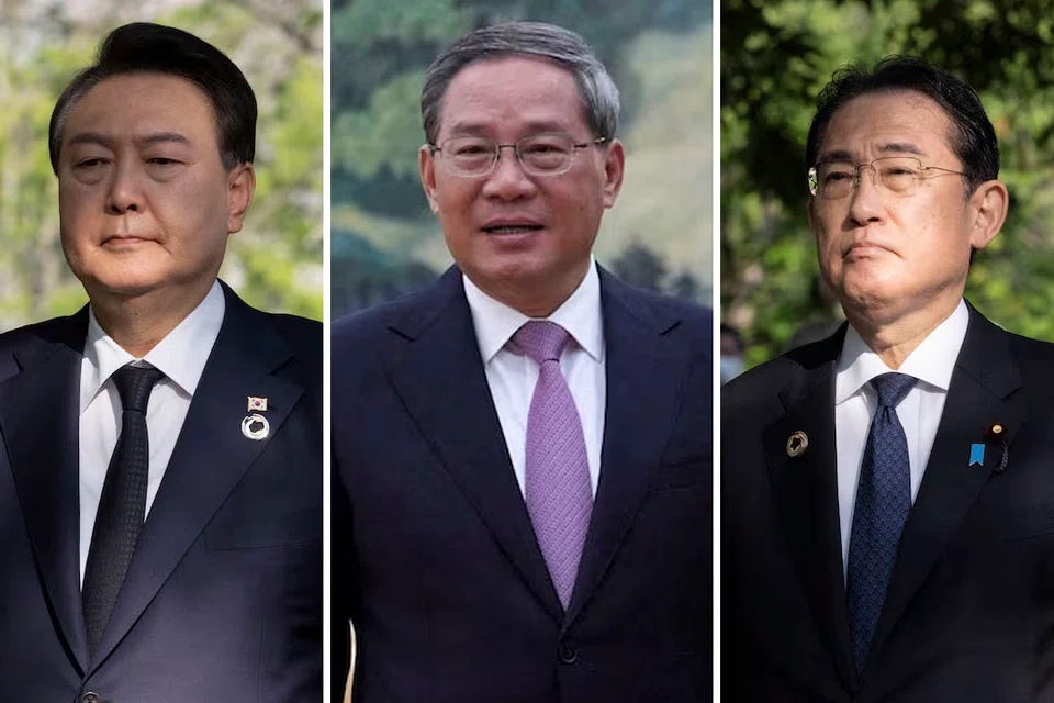 South Korean President Yoon Suk-yeol (left) will hold bilateral talks with Chinese Premier Li Qiang (middle) and Japanese Prime Minister Fumio Kishida (right) on May 26.