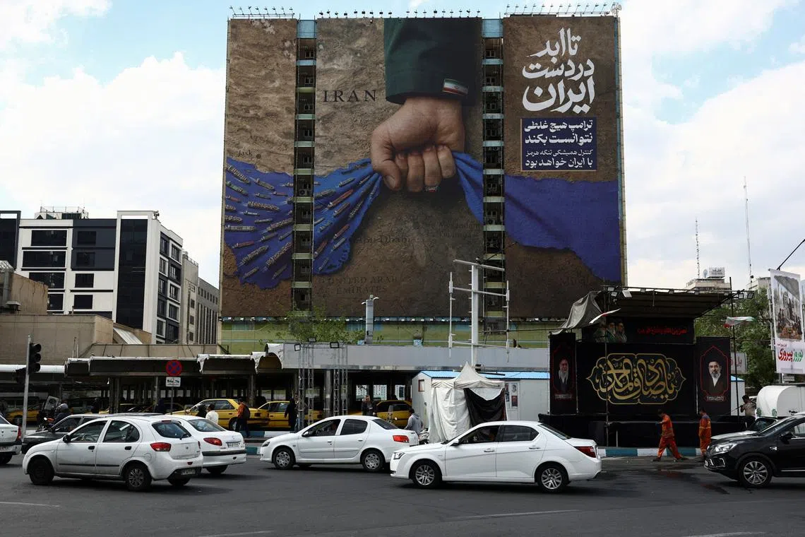 A billboard on a building in Tehran on April 13 declaring that the Strait of Hormuz belongs to Iran.