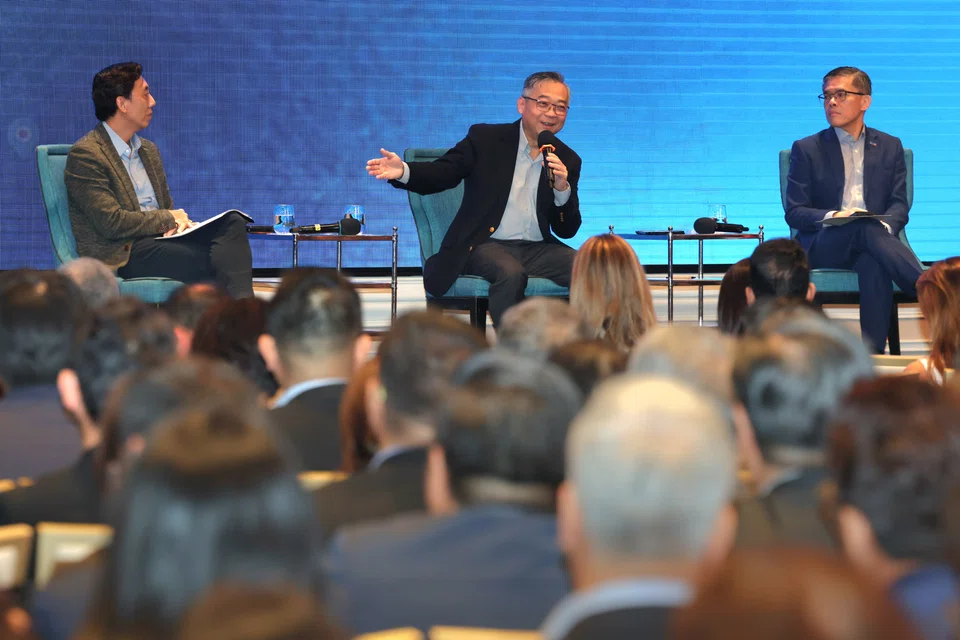 From left: Acting Transport Minister Jeffrey Siow, Deputy Prime Minister Gan Kim Yong and SBF CEO Kok Ping Soon. DPM Gan says he has been reminding Singaporeans they “mustn’t be too happy” about the relatively low tariff rate the country faces.