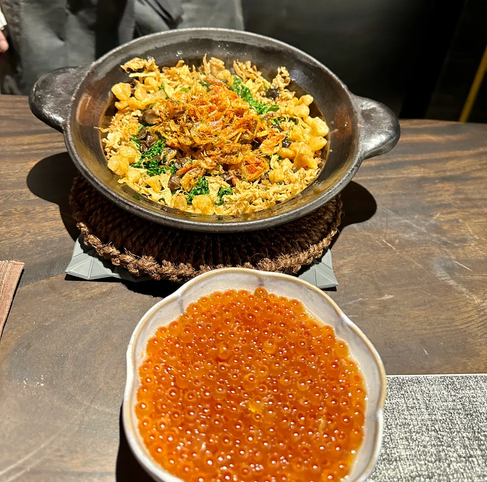 Claypot rice with sakura ebi and ikura.