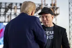 Former President Donald Trump with Tesla CEO Elon Musk during a rally in Butler, Pennsylvania, Oct 5, 2024. Musk has already given away US$16 million to registered swing state voters who qualified for the giveaway by signing his political petition.