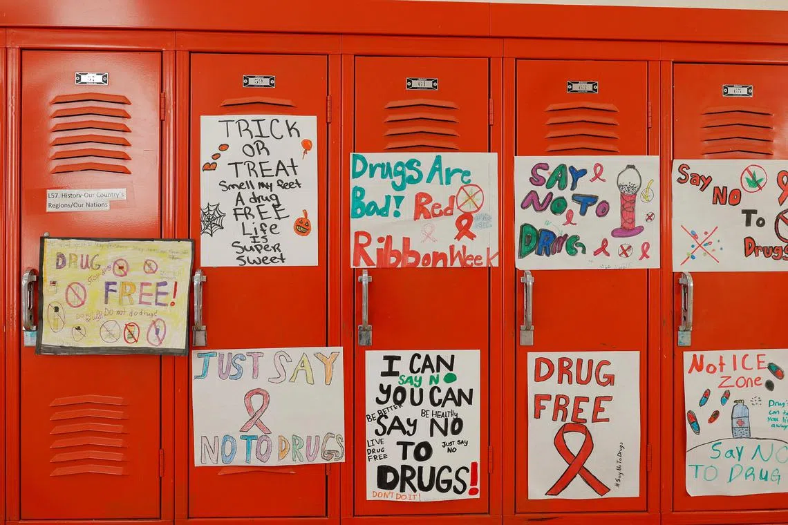 Hand-drawn signs in a school in the US. A serious drive to counter drug abuse needs to prioritise tackling demand.