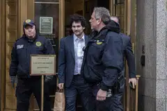 Sam Bankman-Fried, who was convicted of stealing US$8 billion from customers of his international crypto exchange, FTX, leaving a federal district court in New York, December 2022. 
