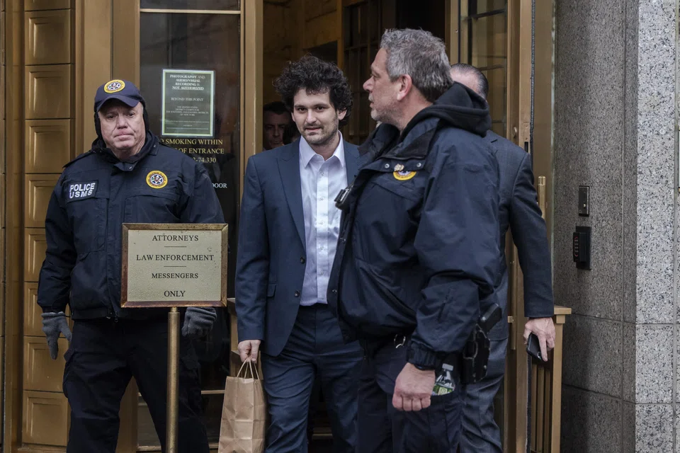 Sam Bankman-Fried, who was convicted of stealing US$8 billion from customers of his international crypto exchange, FTX, leaving a federal district court in New York, December 2022. 