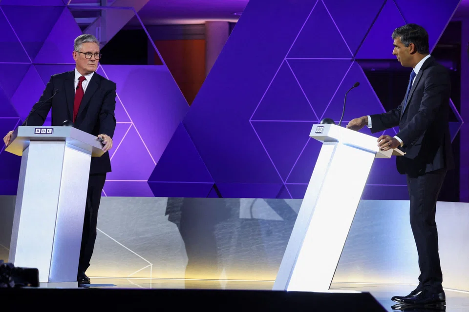 UK Prime Minister and Conservative Party leader Rishi Sunak (right) and Labour Party leader Keir Starmer at their live TV debate in Nottingham on Jun 26, 2024. Absent from the sparring : Brexit.