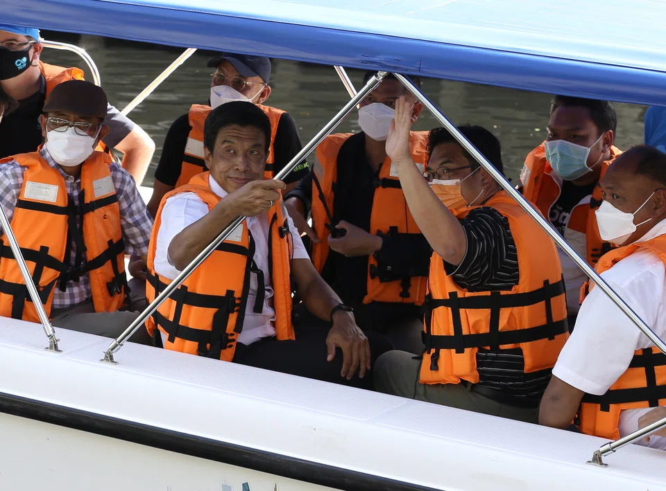 Bangkok governor Chadchart Sittipunt observes the Lat Phrao canal to plan for flooding prevention after winning the election on May 23.