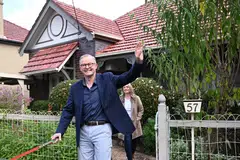 Anthony Albanese leaves his house with his partner Jodie Haydon and his dog Toto in Marrickville,  Sydney, Australia, 22 May 2022. Albanese will be just the fourth person to lead Labor to government from opposition since World War II. 