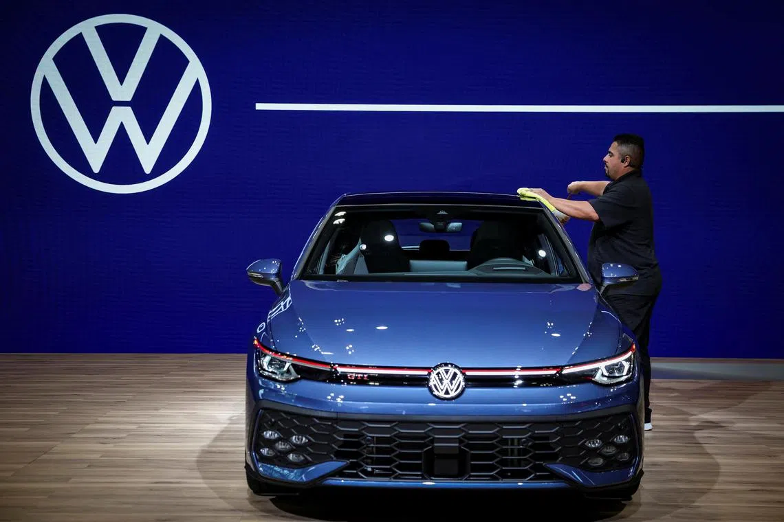 Volkswagen also cited internal restructuring expenses and greater sales of lower-margin electric vehicles for the forecast change.