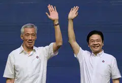 PM Lee Hsien Loong (left) affirms his confidence in DPM Lawrence Wong and the 4G leaders in his National Day Rally address.