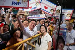 PAP's candidate for Marymount SMC Gan Siow Huang taking a wefie with supporters at a party rally on Apr 30.