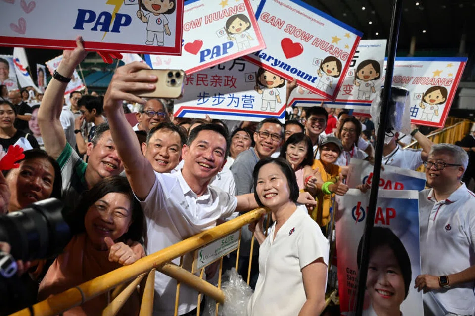 PAP's candidate for Marymount SMC Gan Siow Huang taking a wefie with supporters at a party rally on Apr 30.