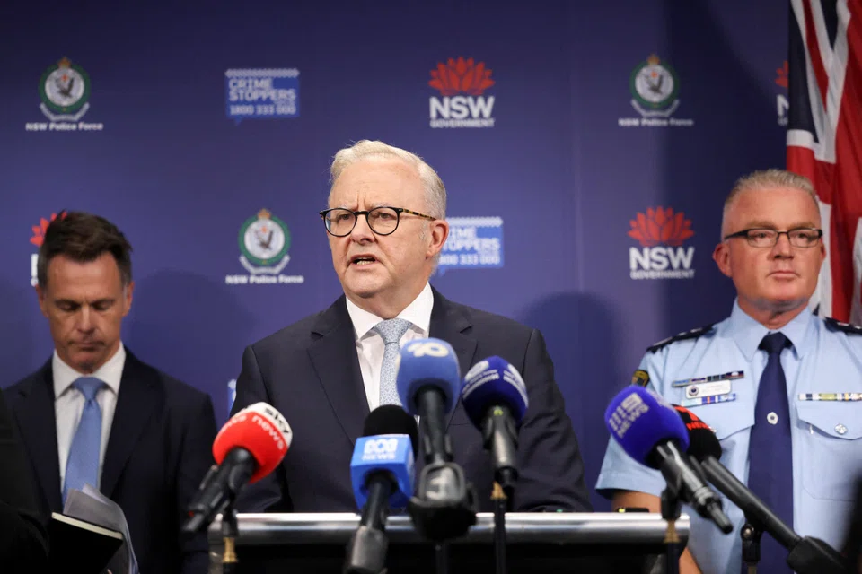 Australian Prime Minister Anthony Albanese (centre) during a visit to the NSW Police headquarters, Sydney, Australia, Dec 16, 2025.
