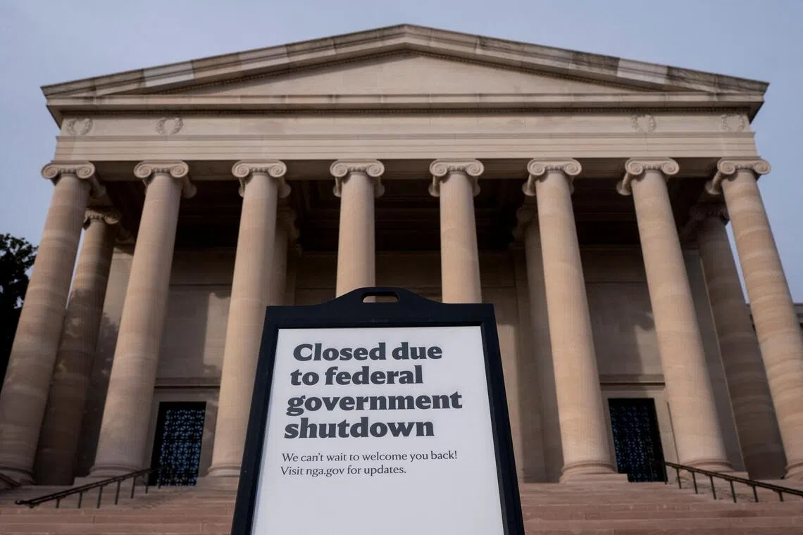 Signage warning of closures due to the US government shutdown in front of the National Gallery of Art. In the US, public debt now stands at 99% of GDP.
