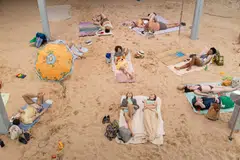 The extraordinary work 'Sun & Sea' features sunbathers singing songs about climate change. 