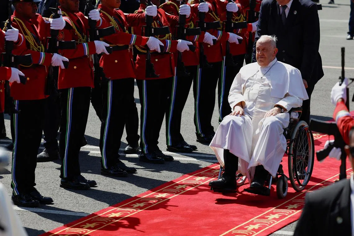 Pope Francis is welcomed upon his arrival at Presidente Nicolau Lobato International Airport, during his apostolic visit to Asia, in Dili, East Timor on Sep 9, 2024. 