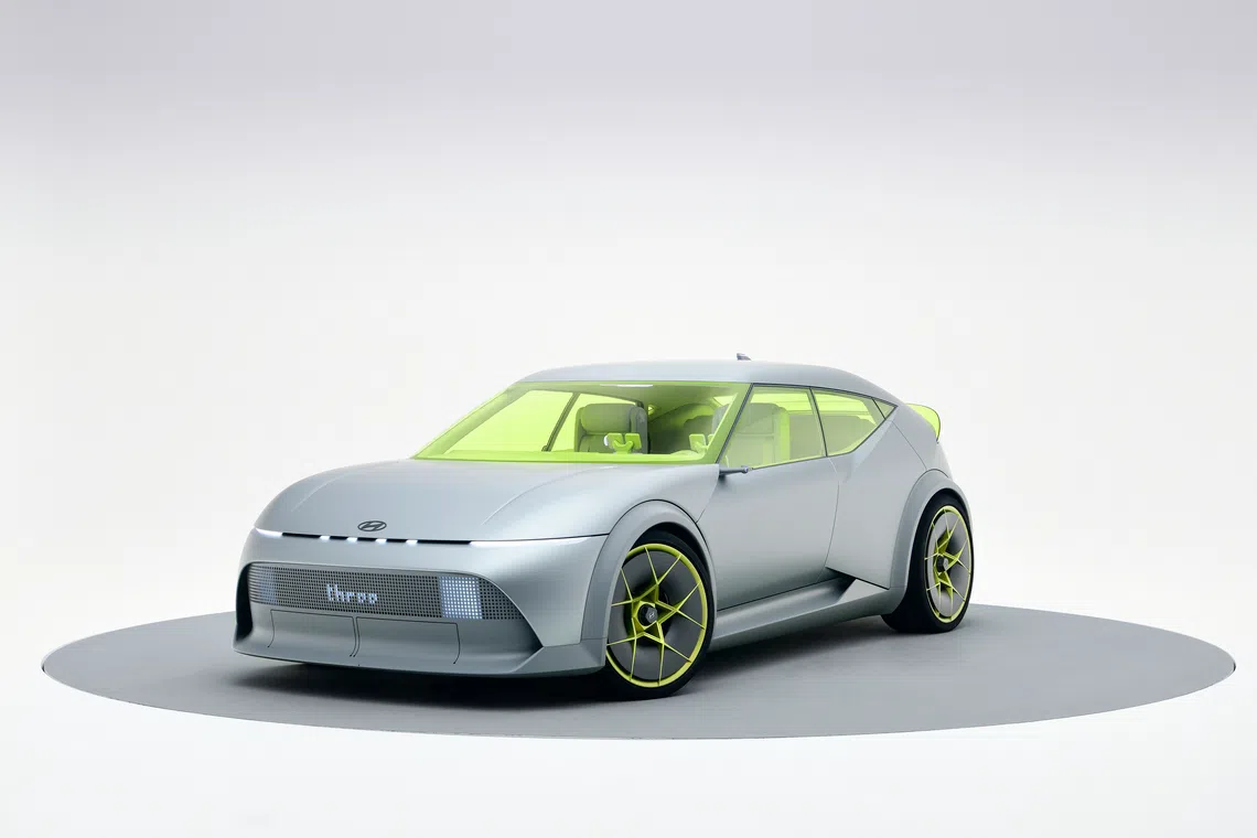 The Ioniq Concept Three looks taut and mischievous, with a ducktail spoiler, muscular haunches and a stance that would turn any racer's head.