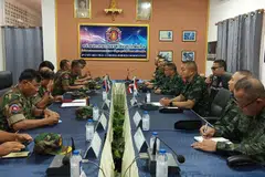 Commanders of the Royal Thai Army (R) and Royal Cambodian Army (L)  met at the border and agreed to maintain the ceasefire, stop any troop movement, and facilitate the return of the wounded and dead bodies.