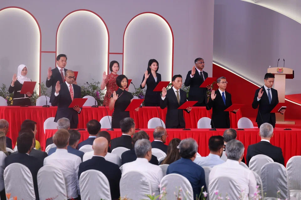 Above: The swearing-in of 20 political office holders at the Istana in May 2025. The panel reviewing their salary framework has a chairman and eight members, drawn from across industry.   
