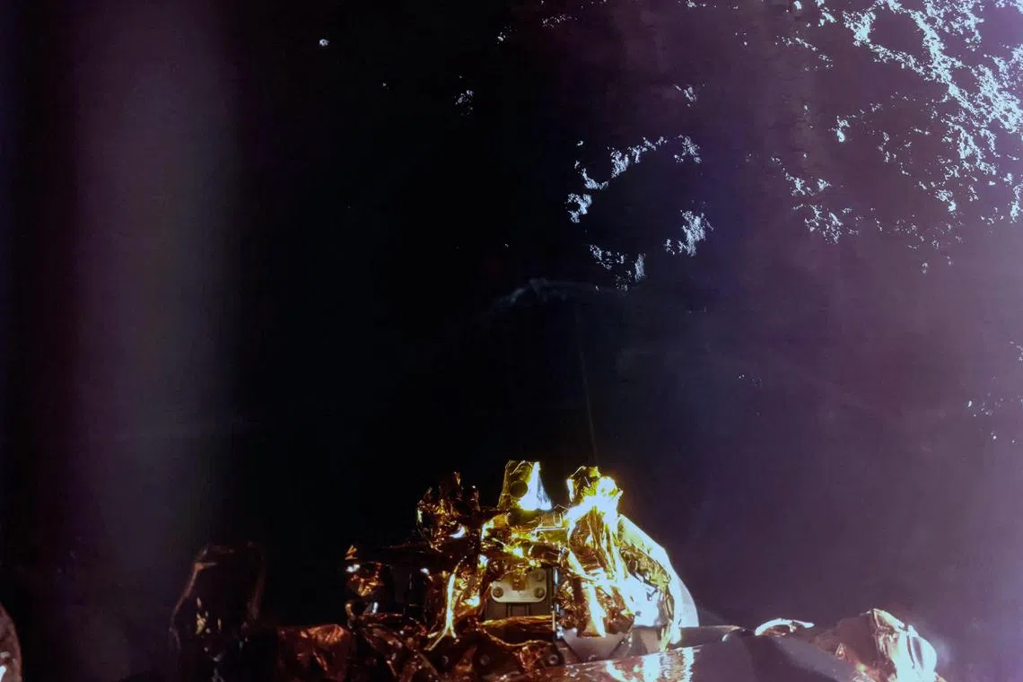 In this handout photograph taken and released by Firefly Aerospace on March 2, 2025, the Firefly's Blue Ghost lander manoeuvres its lunar landing as part of the Ghost Mission 1. 