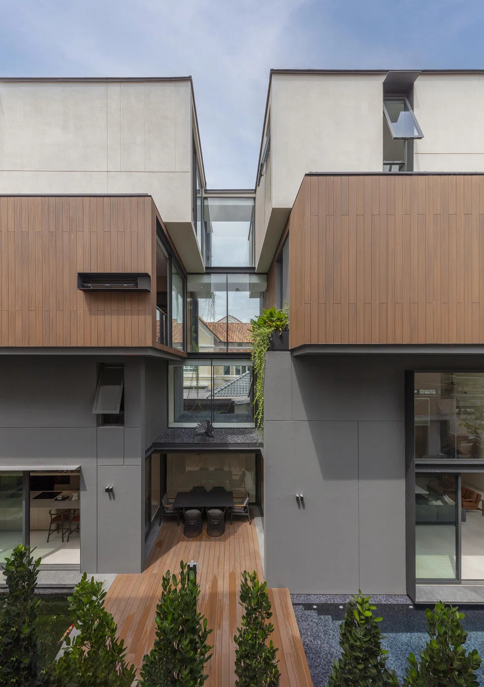 The architecture’s staggered "boxes" create canopies that provide shade.