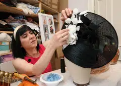 The Turkish-born milliner has been busy making hats for guests attending the annual Royal Ascot racing event, where headwear is a must.