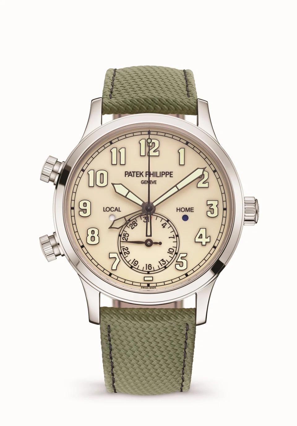 The new Patek Philippe Calatrava Pilot Travel Time 5524G-010 boasts an elegant vintage-style ivory lacquered dial, as well as a khaki green composite-material strap with fabric pattern.  